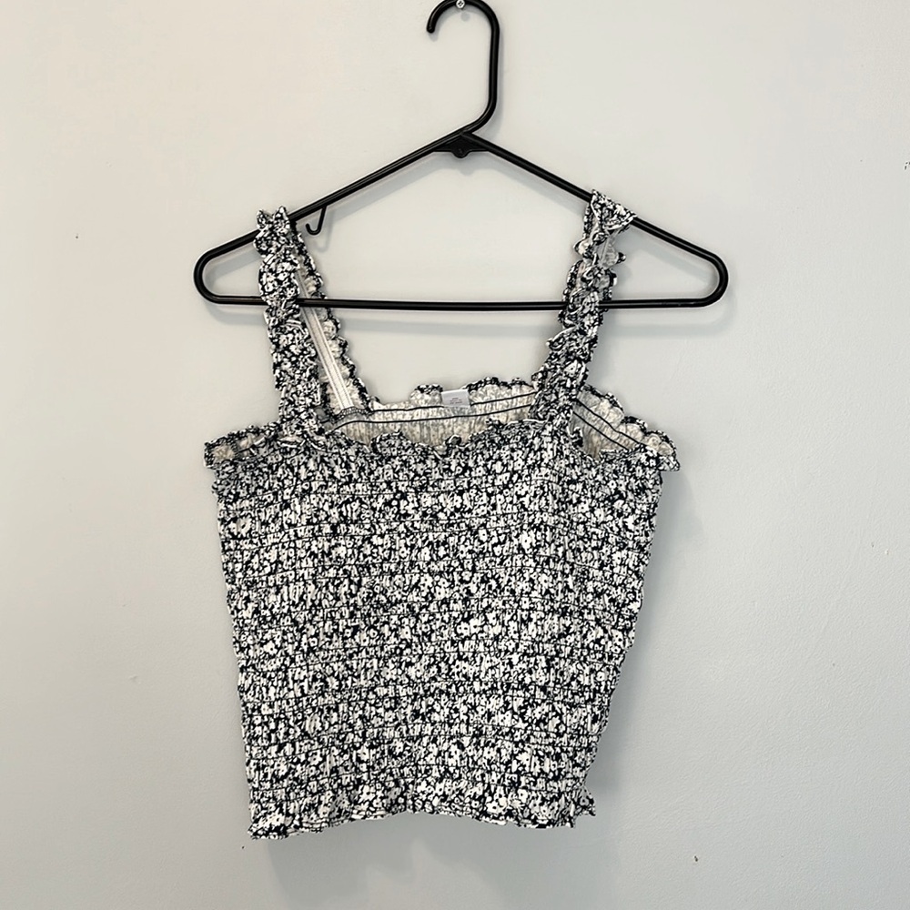 Adorable navy and white smocked tank. Size Medium. Lots of stretch